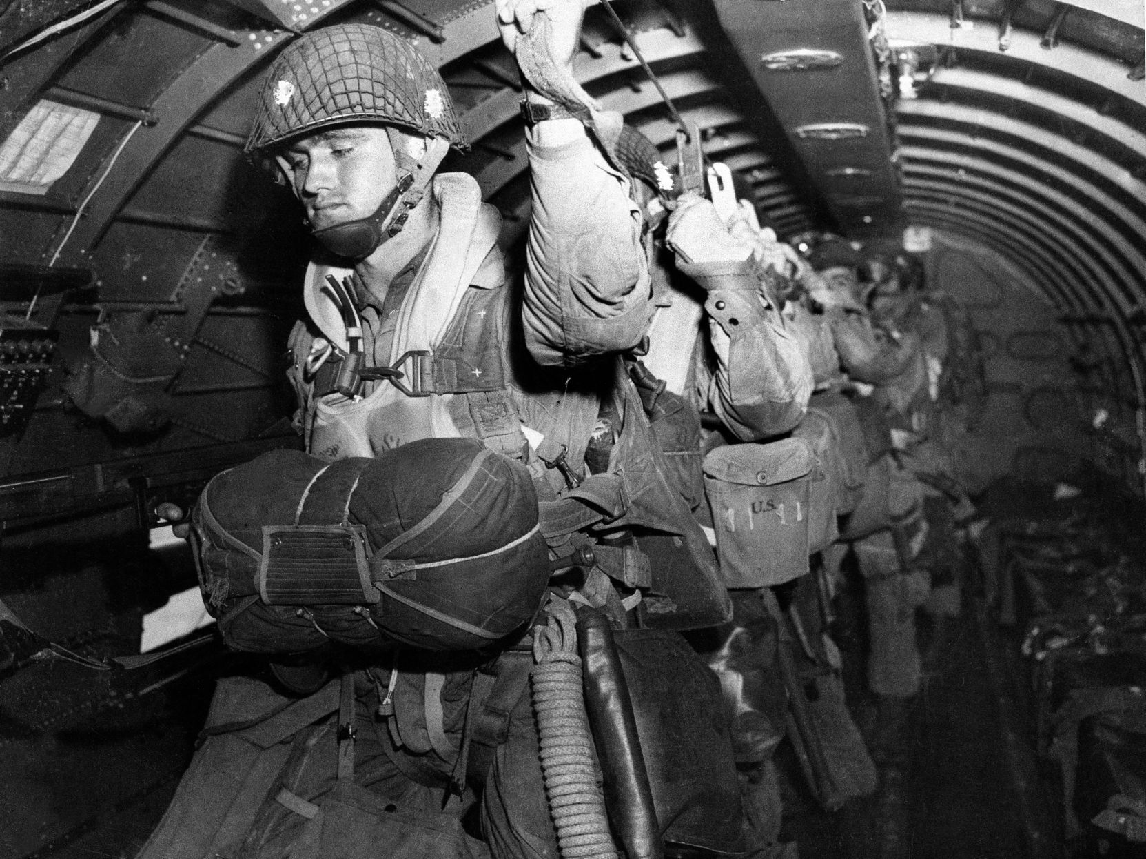Paratroopers prepare before they jump on D-day
